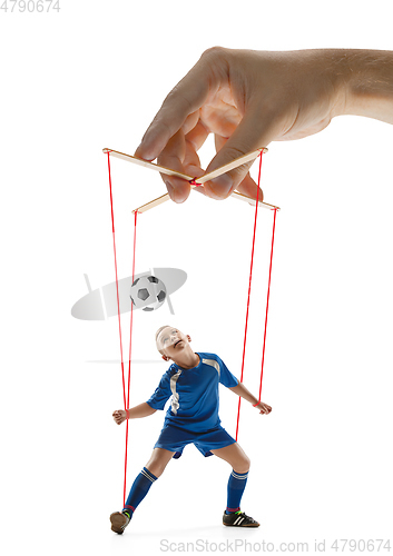 Image of Boy like a puppet in somebodies hands. Concept of manipulation