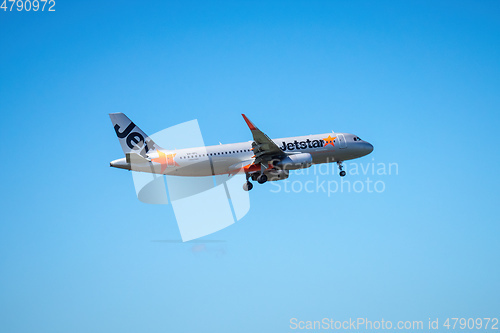 Image of Jetstar airplane is landing at the Auckland Airport
