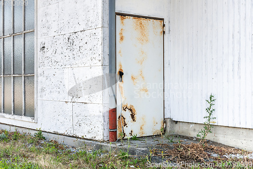 Image of rusty back door
