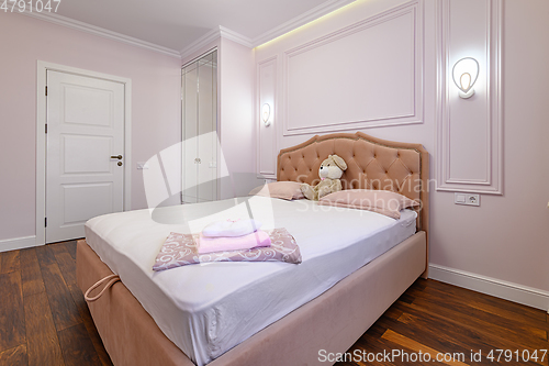 Image of Modern bedroom interior with double bed