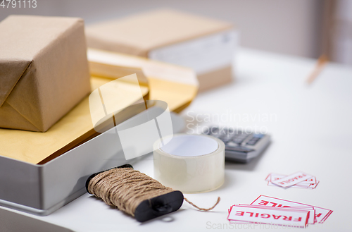 Image of parcel boxes and packing stuff at post office