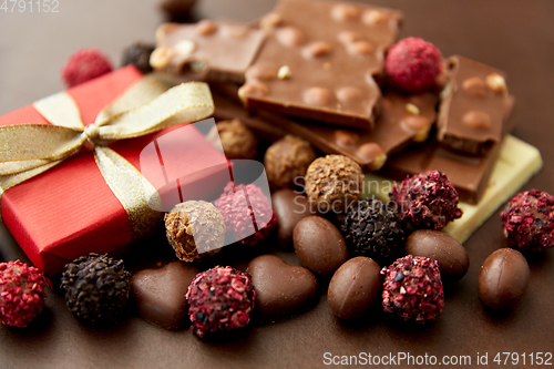 Image of close up of different chocolates, candies and gift