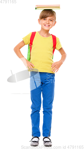 Image of Portrait of a cute little schoolgirl with backpack