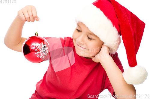 Image of Young happy girl in christmas cloth