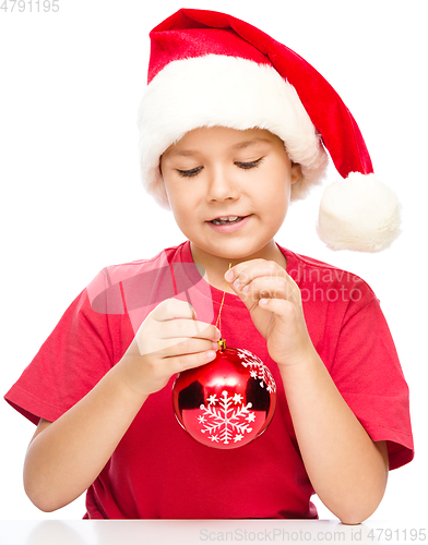 Image of Young happy girl in christmas cloth