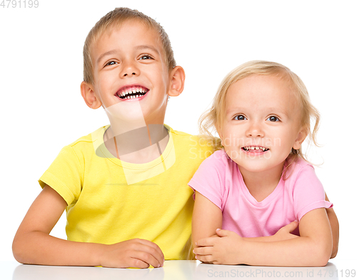 Image of Portrait of a cute little girl and boy