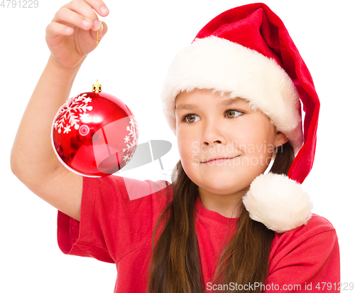 Image of Young happy woman in christmas cloth