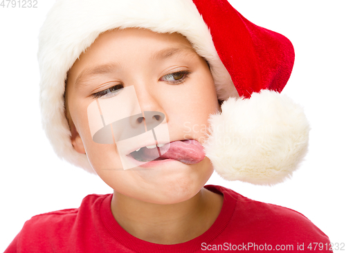 Image of Little girl in santa hat