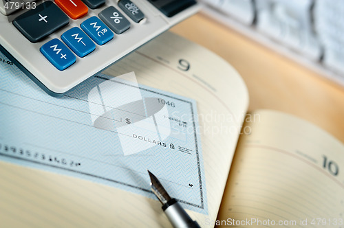 Image of Money check and calculator