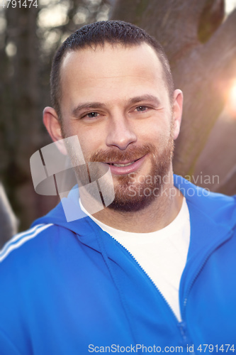 Image of bearded handsome man in sportswear portrait