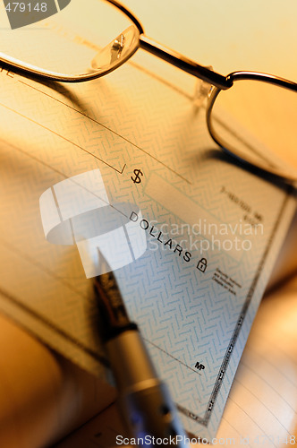 Image of Money check and glasses