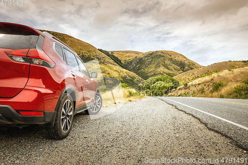 Image of car beside the road