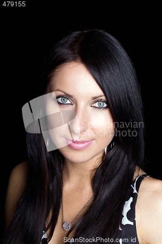 Image of portrait of the beauty young woman. Isolated on black
