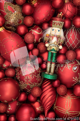 Image of Christmas Nutcracker Soldier and Red Bauble Decorations