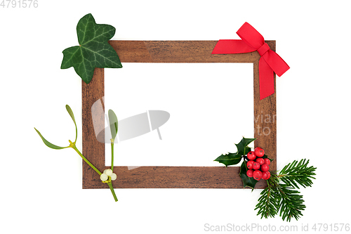 Image of Winter Christmas and New Year Wooden Frame with Flora