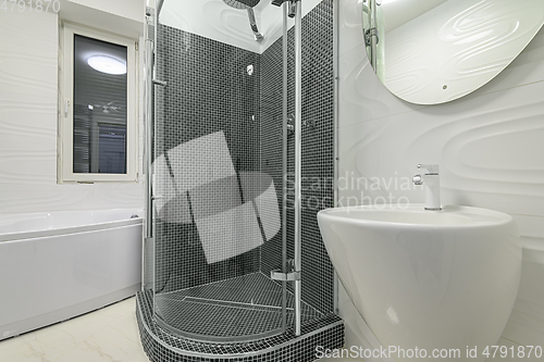 Image of Modern luxury white and chrome bathroom