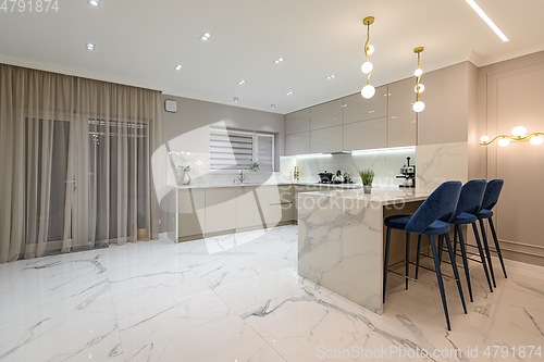 Image of Luxury white modern marble kitchen in studio space