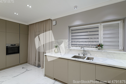 Image of Luxury white modern marble kitchen in studio space