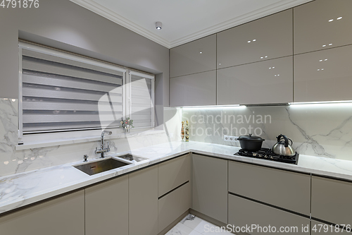 Image of Luxury white modern marble kitchen in studio space