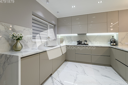 Image of Luxury white modern marble kitchen in studio space