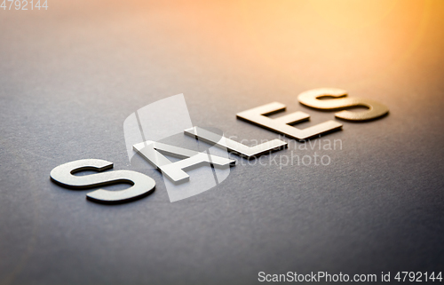 Image of Word sales written with white solid letters