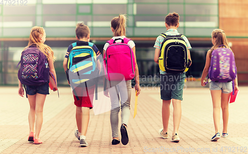 Image of group of happy elementary school students walking