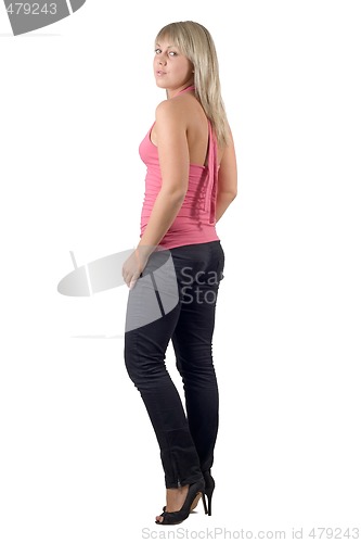 Image of The beautiful young woman in black jeans and pink jacket. Isolat