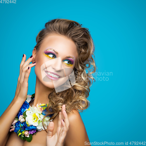 Image of beautiful girl with flower accessories