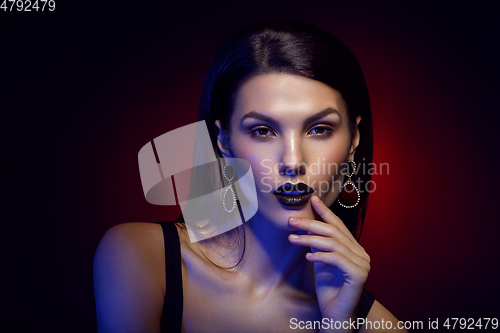 Image of beautiful girl with black lips