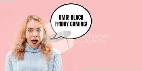 Image of Portrait of woman surprised and shocked of black friday