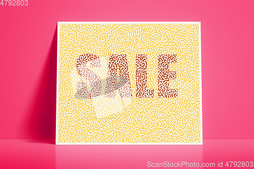 Image of textured card with the word sale