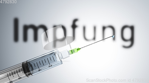 Image of A syringe with the word vaccination in german language