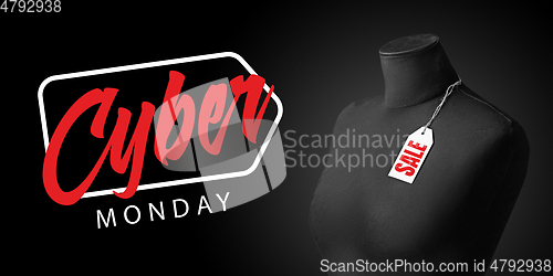 Image of Front view of mannequin with cuber monday lettering on black background.