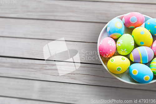 Image of close up of colored easter eggs on plate