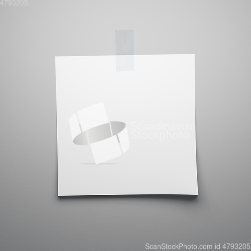 Image of blank sheet of paper sticks on the wall