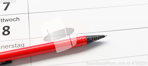 Image of calendar german language with pen and space for your message