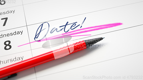 Image of calendar with a red pen and the word date