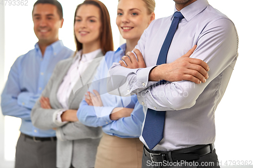 Image of close up of smiling business people at office