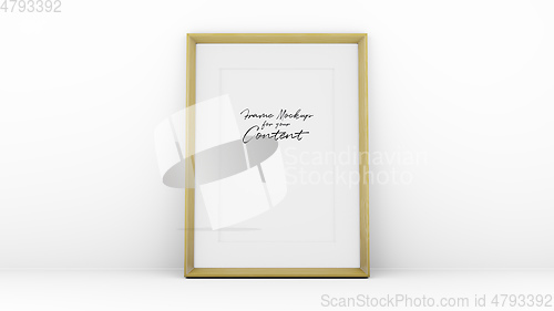 Image of wooden frame on a white wall with space for your content