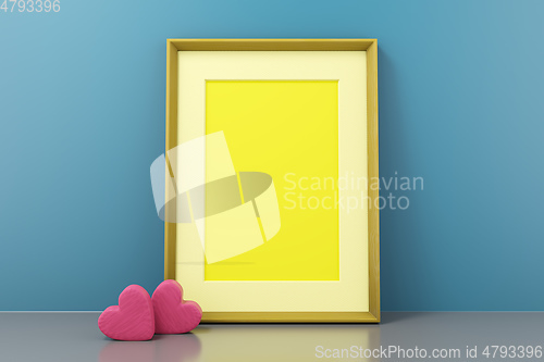 Image of wooden frame on a wall with hearts