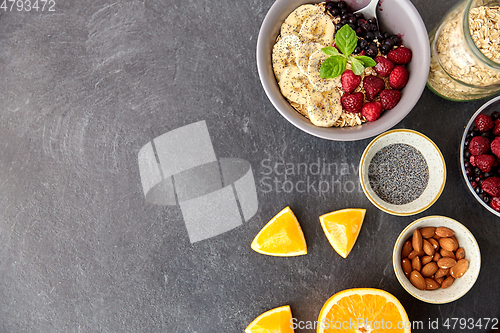 Image of cereal with berries, fruits, nuts and poppy seeds