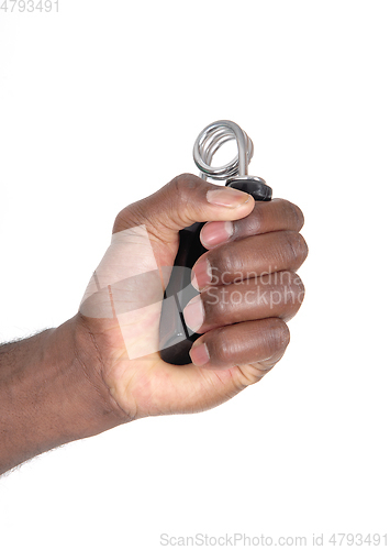 Image of Isolated hand of African man with exercise tool