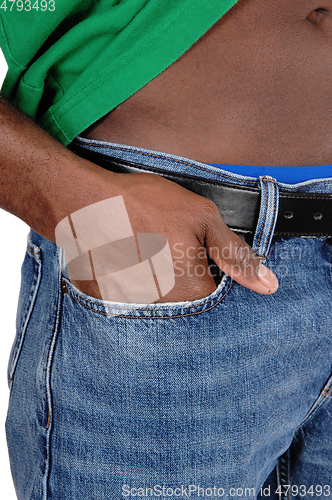 Image of The hand in the front pocket of jeans