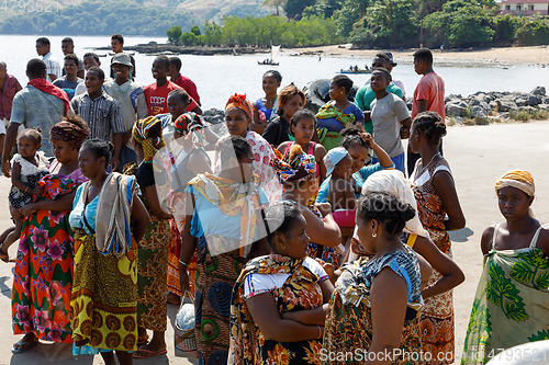 Image of Malagasy woman waiting for transport ship, Nosy Be, Madagascar