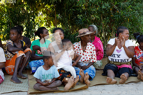 Image of Malagasy woman from village traditional singing and dancing