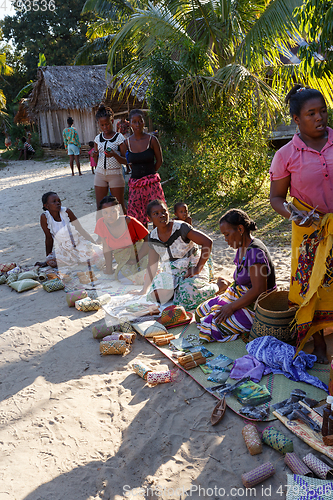 Image of Malagasy woman from village selling souvenir, Madagascar