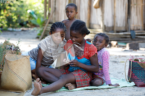 Image of Malagasy woman from village traditional singing and dancing