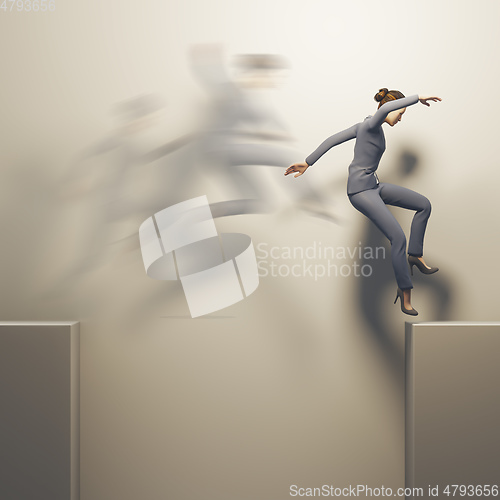 Image of business woman jumps over a gap