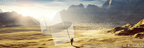 Image of lonely man in the dry sunset desert