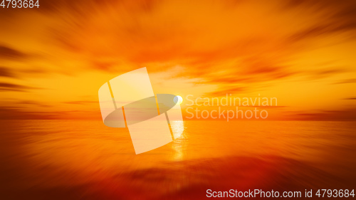 Image of speed flight over the sunset ocean